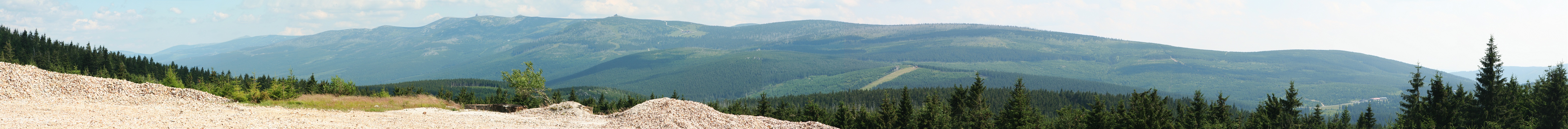 Panorama of the Karkonosze (Giant Mountains) from the 'Stanislaw' open-pit quartz mine in the Izera Mountains